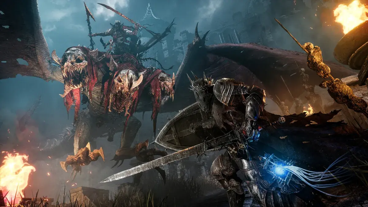 Massive boss encounter with a winged deity in a gothic cathedral